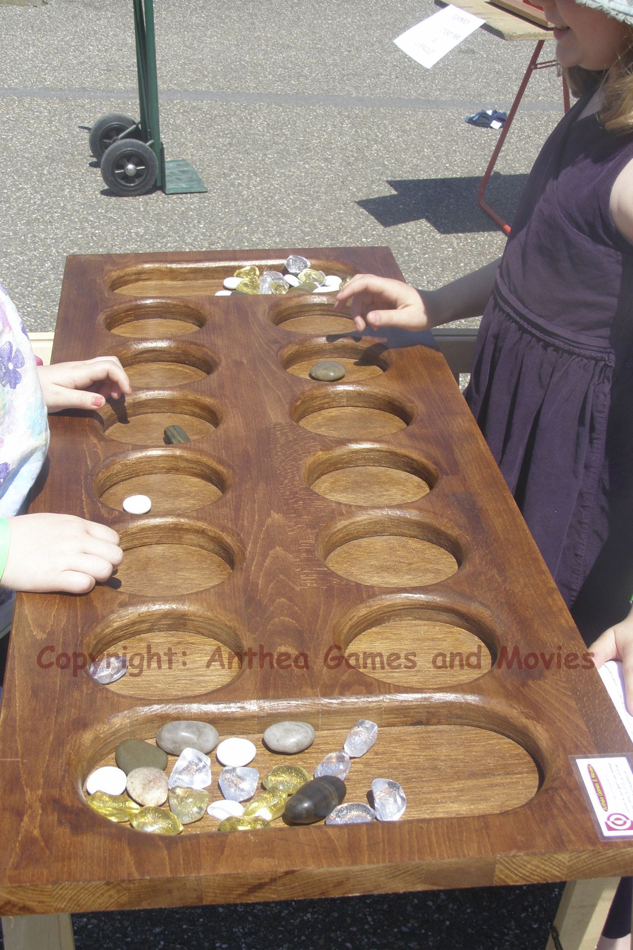 Location du jeu en bois "Awalé"  -  Anthea Games