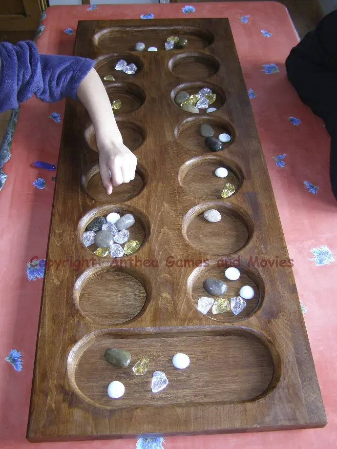 Location du jeu en bois "Awalé"  -  Anthea Games