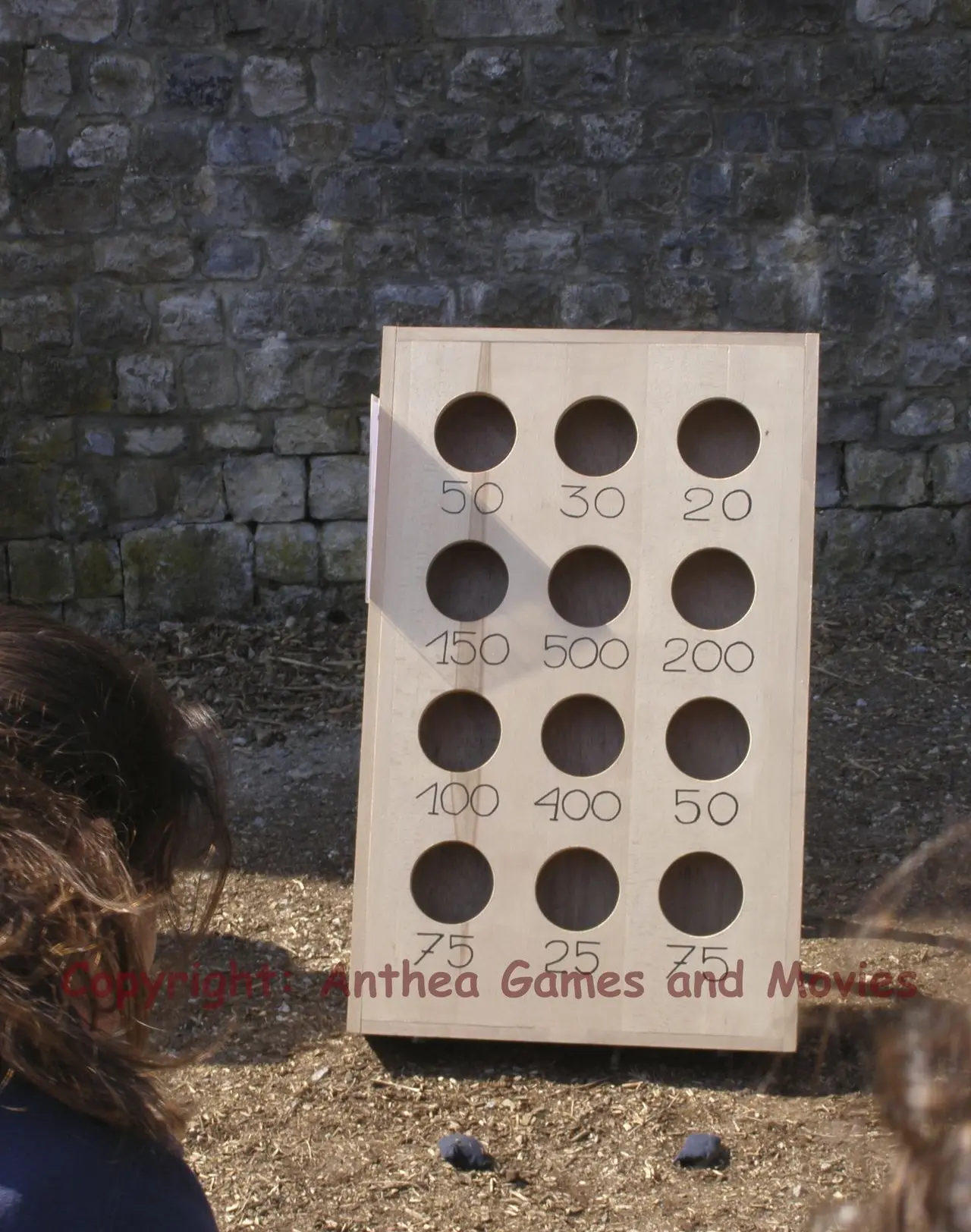 Location du jeu en bois "Lancer de l'aumônière." - Anthea Games